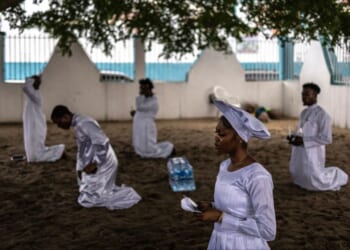 Christian worshippers pray at the Celestial Church of Christ international headquarters in Lagos, Nigeria on July 12, 2026.