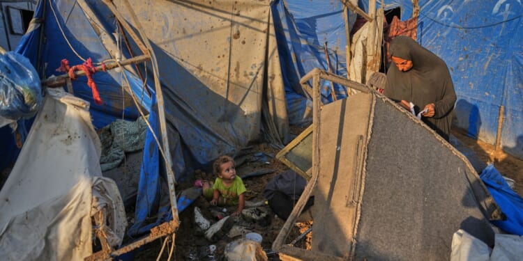 Palestinians in Gaza hope Hamas will disarm but fear Israeli forces won't withdraw