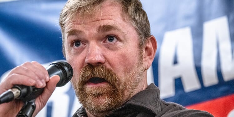 Then-Maine Democratic Senate candidate Graham Platner is pictured in a June 7 file photo speaking in Portland.