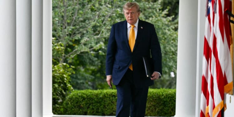 President Donald Trump arrives to speak in the Rose Garden of the White House in Washington, D.C., on Aug. 24, 2026.
