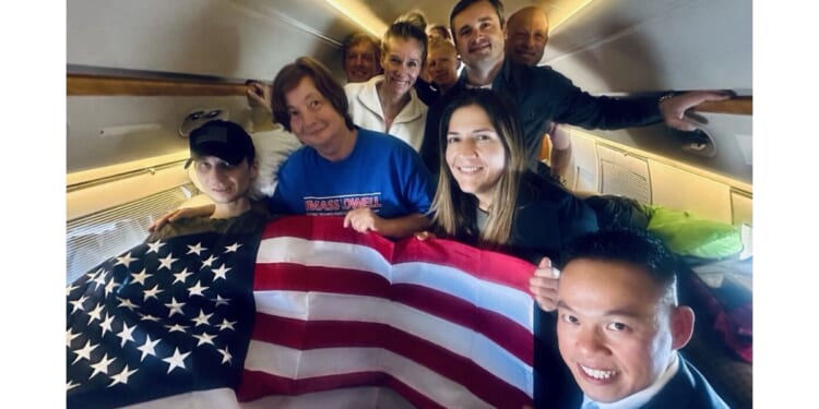 Secretary of State Marco Rubio shared a photo of Robert Gilman, left, on his flight home.