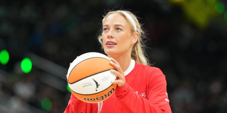 Sophie Cunningham of the Indiana Fever warms up before the game against the Seattle Storm at Climate Pledge Arena on July 28, 2026, in Seattle, Washington.