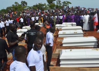 Coffins are prepared for a funeral service for 17 worshippers and two priests in Nigeria who were believed to have been killed by Fulani herdsmen in Benue State, north-central Nigeria on May 22, 2018.