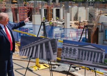 President Donald Trump speaks and points at the construction site of his newly proposed White House ballroom at the White House in Washington on May 19, 2026.