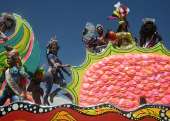 A float with costumed participants passes by during the 2025 Denver Pride Parade on June 29, 2025 in Denver, Colorado. Organizers estimate that over 100,000 will attend the LGBTQ+ pride festivities. (Photo by Mark Makela/Getty Images)