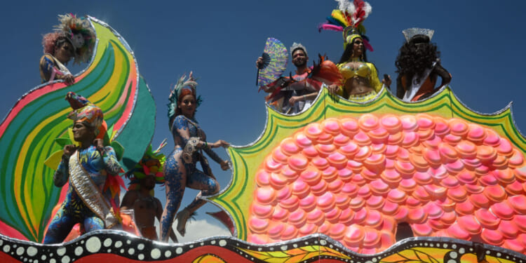 A float with costumed participants passes by during the 2025 Denver Pride Parade on June 29, 2025 in Denver, Colorado. Organizers estimate that over 100,000 will attend the LGBTQ+ pride festivities. (Photo by Mark Makela/Getty Images)