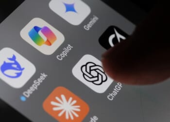 Apple iPhone screen with artificial intelligence icons in London, United Kingdom, on May 2, 2025.