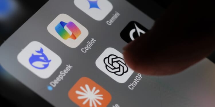 Apple iPhone screen with artificial intelligence icons in London, United Kingdom, on May 2, 2025.