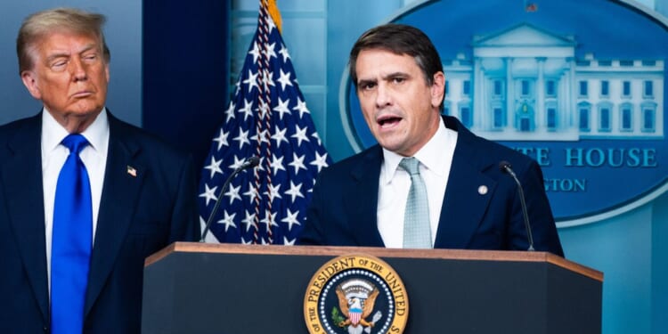 Then-Deputy Attorney General Todd Blanche is seen at a news briefing with President Donald Trump in June 2025 at the White House.