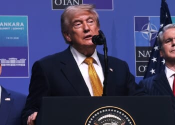 President Donald Trump, with Secretary of State Marco Rubio, left, and Treasury Secretary Scott Bessent, right, speaks in a July 8 file photo from the NATO summit in Ankara, Turkety.