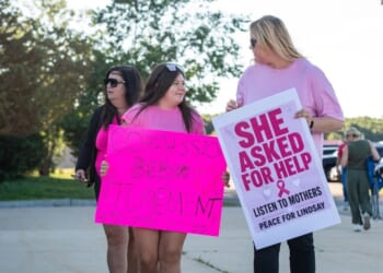 Supporters of Lindsay Clancy hold signs outside the Plymouth County Superior Court during Lindsay Clancy's murder trial in Plymouth, Massachusetts, on Aug. 26, 2026.