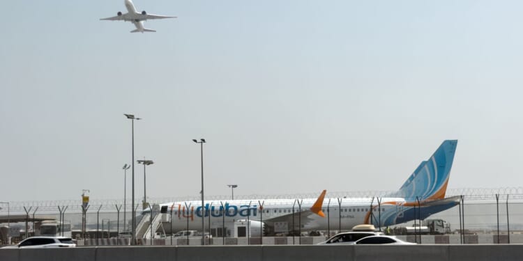 A commercial plane traveling from Dubai to Israel is diverted to Saudi Arabia after a distress call