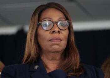 New York State AG Letitia James looks down as Governor Kathy Hochul gives a press conference on August 12, 2026.