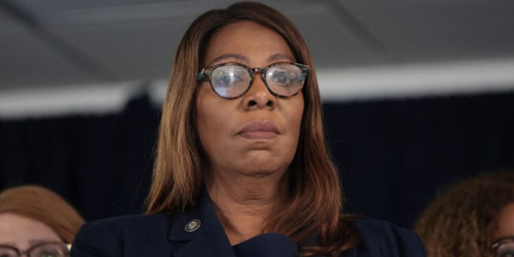 New York State AG Letitia James looks down as Governor Kathy Hochul gives a press conference on August 12, 2026.