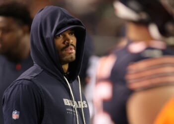 Caleb Williams #18 of the Chicago Bears looks on from the sidelines Monday during the third quarter of the game against the Philadelphia Eagles at Soldier Field in Chicago, Illinois.