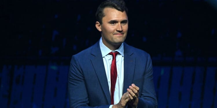 Charlie Kirk takes the stage during a Turning Point Action 'United for Change' campaign rally for President Donald Trump in Las Vegas, Nevada, on Oct. 24, 2024.