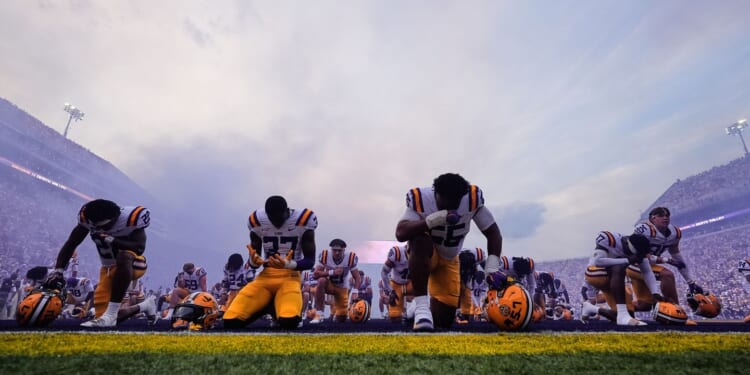 Breaking down the college sports act: A salary cap, a 'Lane Kiffin rule' and a superleague ban