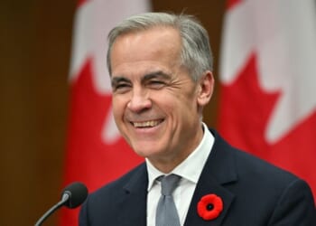 Canadian Prime Minister Mark Carney smiles during a press conference after the 2025 Asia-Pacific Economic Cooperation Economic Leaders' Meeting in Gyeongju on Nov. 1, 2025.