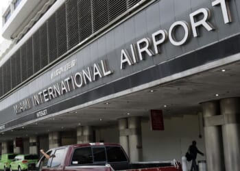 Cargo plane flying for Amazon overshoots runway, crashes near Miami airport