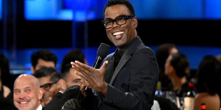 Chris Rock, seen in an April photo, said he doesn't like spending too much time in Los Angeles.