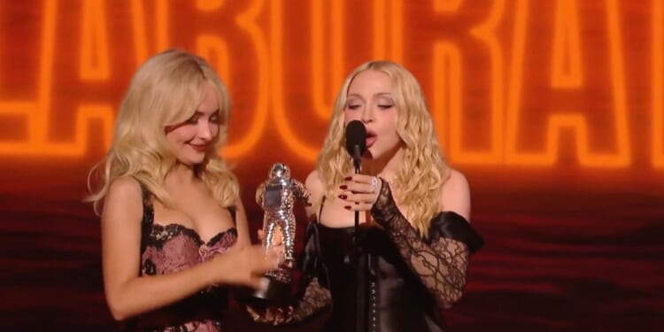 Madonna and Sabrina Carpenter accepting an award at the 2025 Video Music Awards on Sept. 27, 2026.