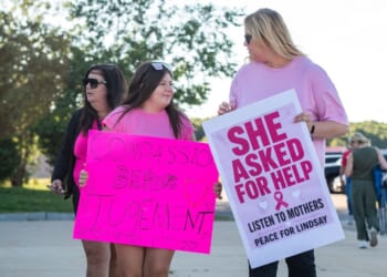 Supporters of Lindsay Clancy hold signs outside the Plymouth County Superior Court during Lindsay Clancy's murder trial in Plymouth, Massachusetts, on Aug. 26, 2026.