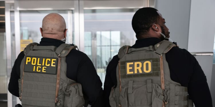 Immigration and Customs Enforcement agents patrol Terminal B at LaGuardia Airport on March 23, 2026, in New York City.