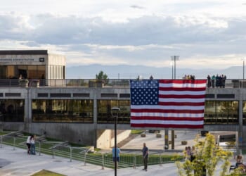 A flag is displayed in memory of right-wing political activist Charlie Kirk at the main campus of Utah Valley University in Orem, Utah, on Sept. 19, 2025.