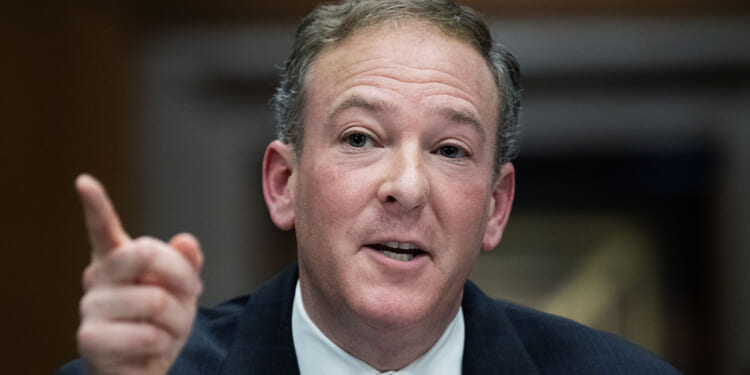 The EPA under Trump is trying to turn plastic waste into an energy and manufacturing resource. Pictured: EPA Administrator Lee Zeldin, a man in a suit and tie speaks while gesturing with his right hand, index finger extended. He appears to be in a formal setting, possibly a meeting or hearing.