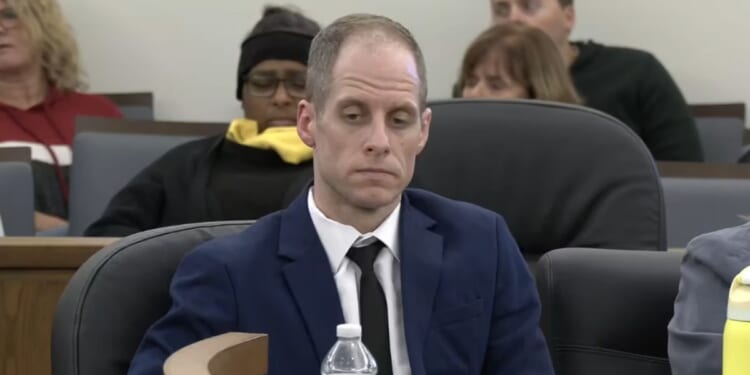 Caleb Flynn of Ohio sits in court during the murder trial for his wife, Ashley Flynn, on Sept. 24, 2026.