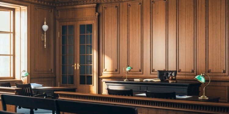 The interior of an empty courtroom.