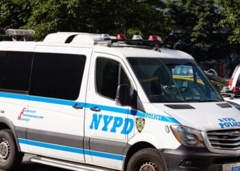 An NYPD Freightliner Sprinter vehicle parked on a street by Central Park on July 5, 2018.
