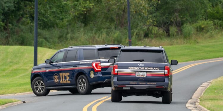 Immigration and Customs Enforcement agents in newly designed vehicles arrive ahead of a scheduled speech by President Donald Trump at the Park Police Anacostia Operating Facility on Aug. 21, 2025, in Washington, D.C.
