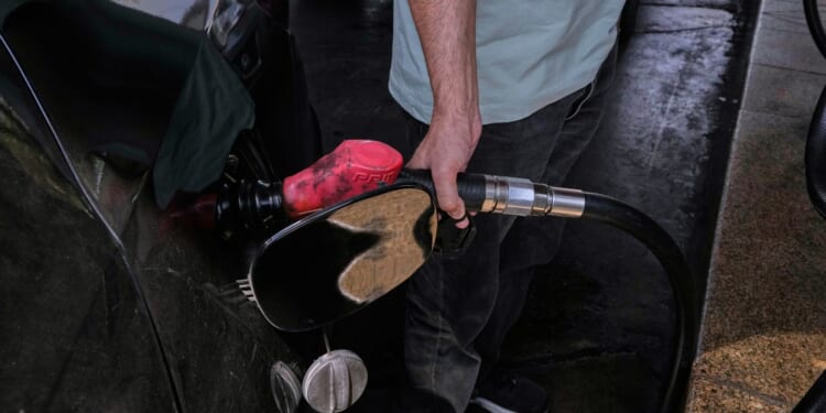 Iran increases gasoline price for its heaviest consumers as economy struggles