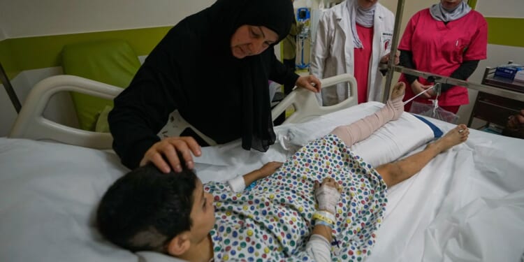 Israeli airstrikes on a village in southern Lebanon kill 12 people, including 2 children