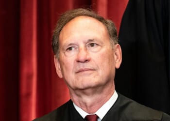 Associate Justice Samuel Alito sits during a group photo of the Justices at the Supreme Court in Washington, D.C., on April 23, 2021.