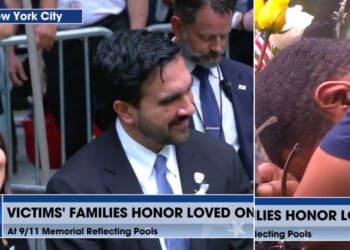 A TV camera cut from the scene of a mourner, right, to Rep. Alexandria Ocasio-Cortez, a New York Democrat, who was giggling with New York City Mayor Zohran Mamdani as the names of 9/11 victims were read.