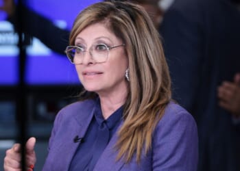 Fox Business anchor Maria Bartiromo speaks on the floor of the New York Stock Exchange during morning trading on July 1 in New York City.