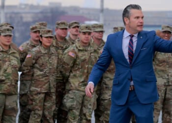 Secretary of War Pete Hegseth address a group of National Guard troops in a file photo from February.