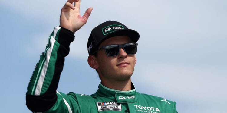 Corey Heim, driver of the Fleetio Toyota, waves to fans as he walks onstage during driver intros prior to the NASCAR Cup Series Cook Out Southern 500 at Darlington Raceway on Sept. 6, 2026, in Darlington, South Carolina.