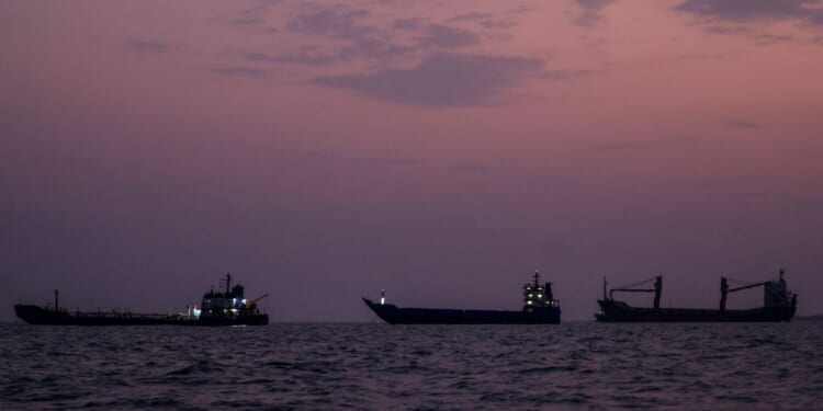 Vessels transit the Strait of Hormuz off the coast of the port city of Bandar Abbas in southern Iran on Sept. 5, 2026.