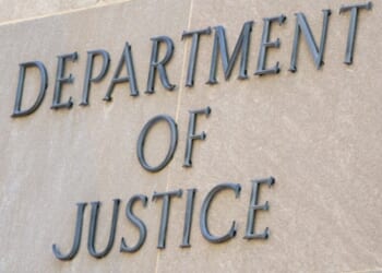 The Department of Justice logo can be viewed on the side of the Justice Department Headquarters in Washington, D.C. on August 8, 2026.