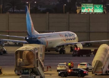 A FlyDubai Boeing 737 MAX 8 aircraft is pictured on the tarmac after landing at Israel's Ben Gurion Airport in Lod on Wednesday.