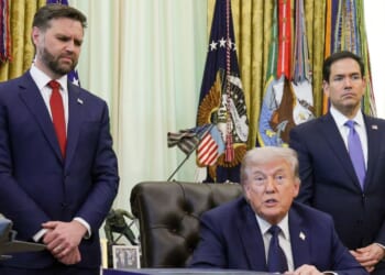 President Donald Trump is flanked by Vice President J.D. Vance, left, and Secretary of State Marco Rubio, right, during an April meeting in the Oval Office of the White House in Washington, D.C.