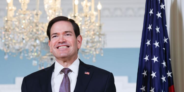 Secretary of State Marco Rubio looks on alongside Saudi Foreign Minister Prince Faisal bin Farhan Al Saud as they pose for photos before a meeting at the U.S. State Department on Sept. 28, 2026, in Washington, D.C.