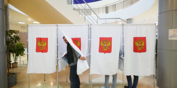 Russian election observer loses consciousness during arrest by police, opposition party says