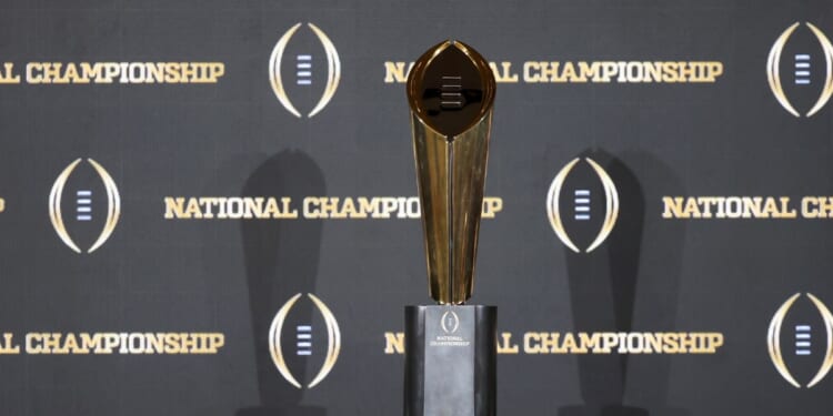 The College Football Playoff National Championship Trophy on display prior to the Head Coaches News Conference at JW Marriott Marquis Miami on Jan. 18, 2026, in Miami, Florida.