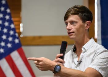 Iowa gubernatorial candidate Rob Sand speaks to voters during a campaign visit to the Carroll County Conservation Classroom on Aug. 20, 2026, in Carroll, Iowa.