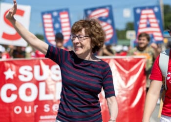 Republican Sen. Susan Collins of Maine marches in a "Moxie Day" parade July 11 in Lisbon, Maine.