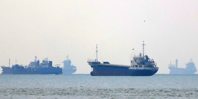 Vessels transit the Hormuz Strait off the coast of Iran's southern port city of Bandar Abbas on Sept. 7, 2026.